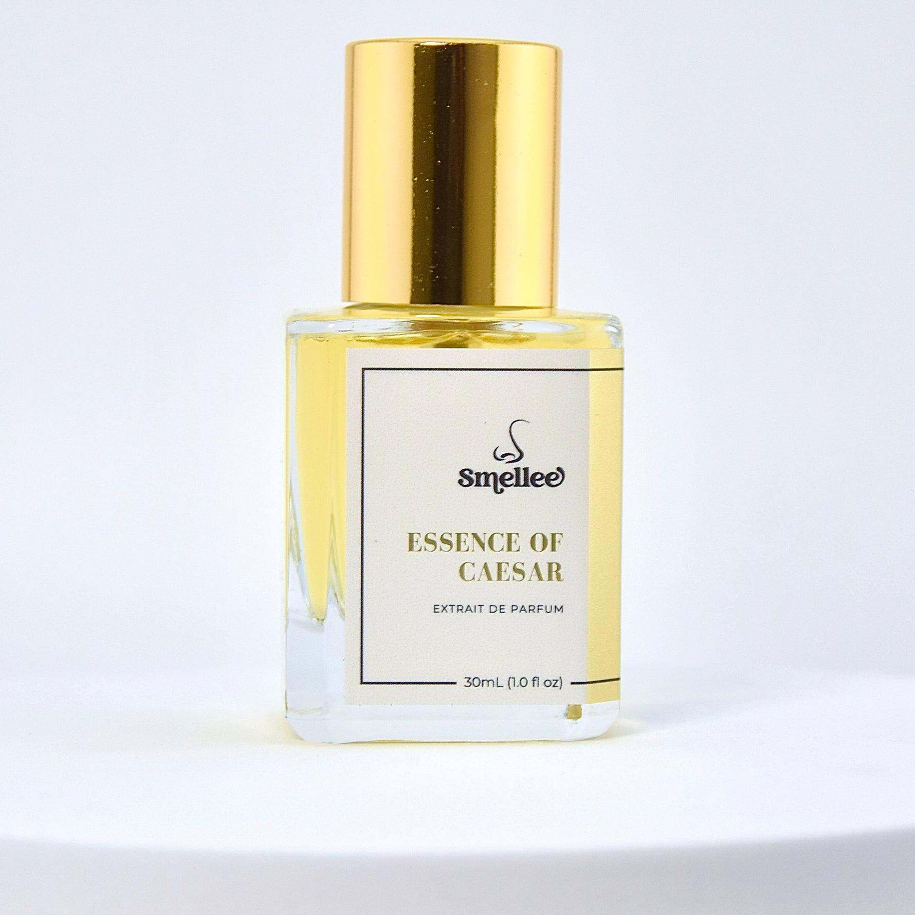 Perfume bottle labeled 'Essence of Caesar' by Smelliee on a white background