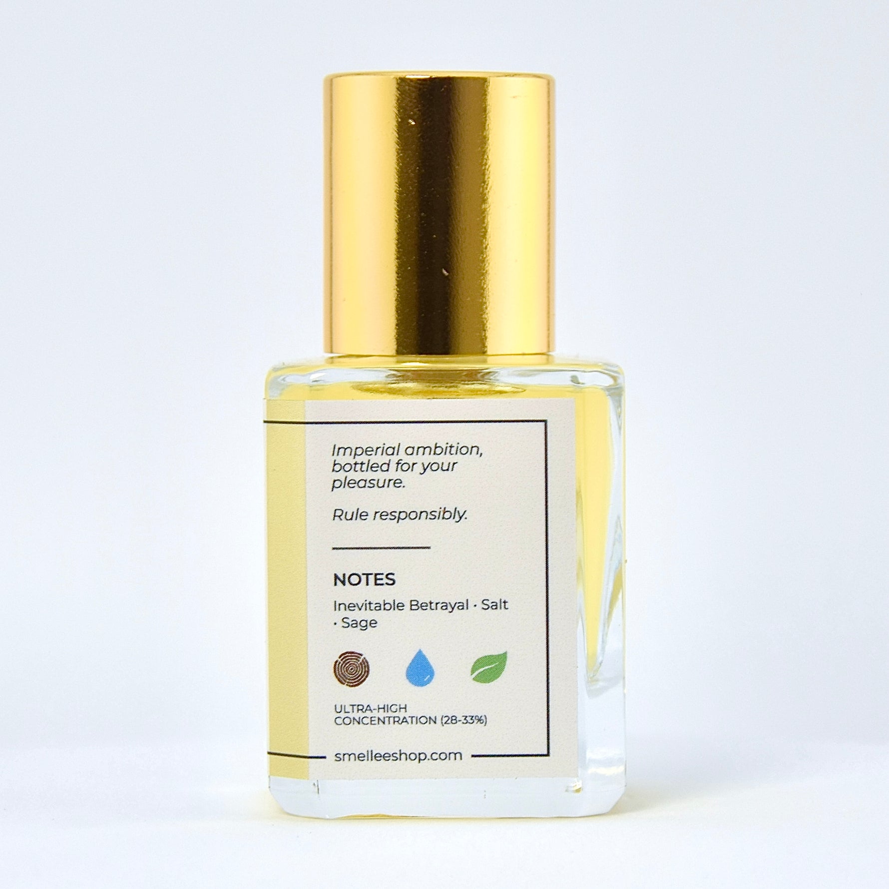 Clear bottle with gold cap on a white background