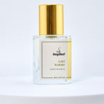 Perfume bottle labeled 'Got Wood?' by Smellie on a light gray background