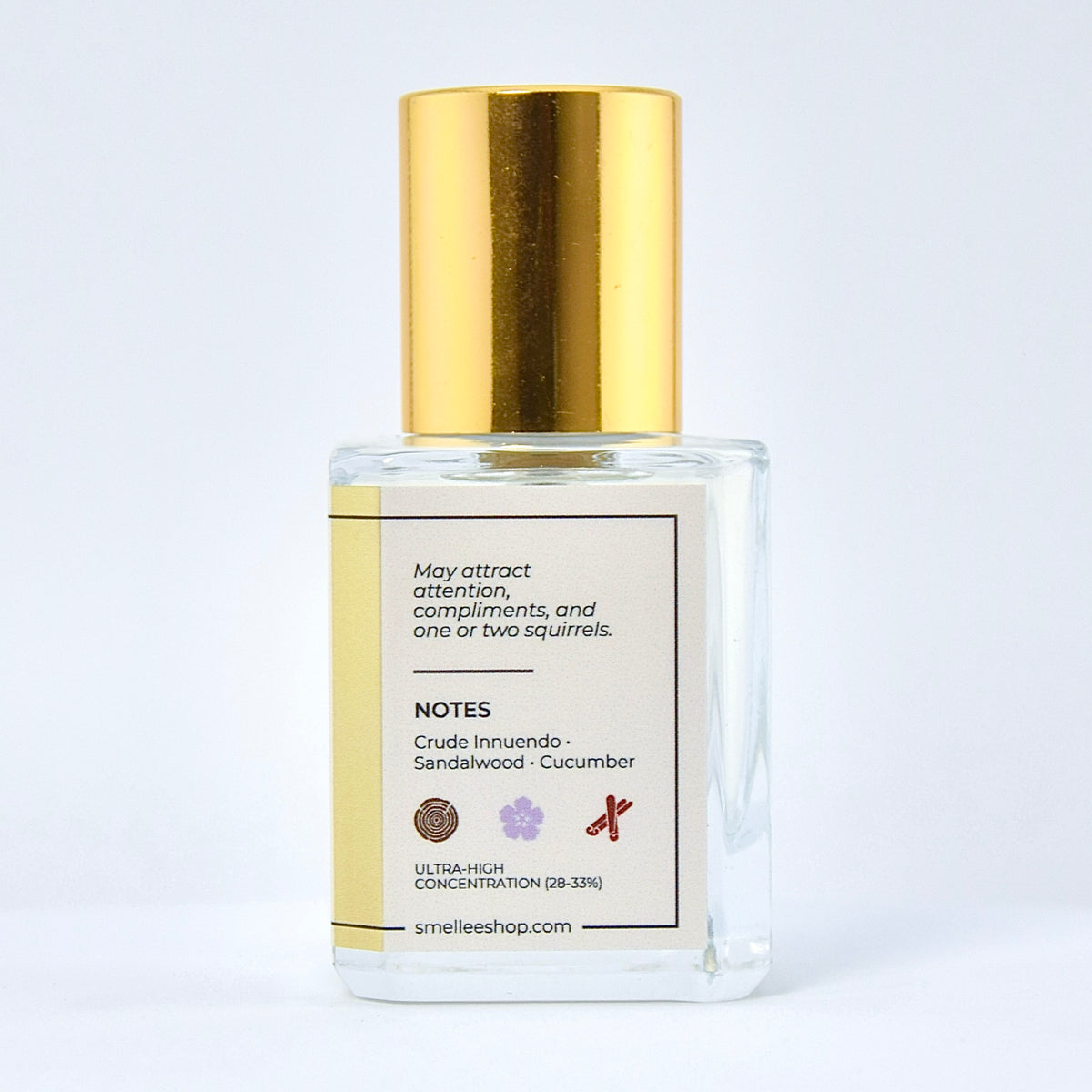 Clear bottle with gold cap on a white background