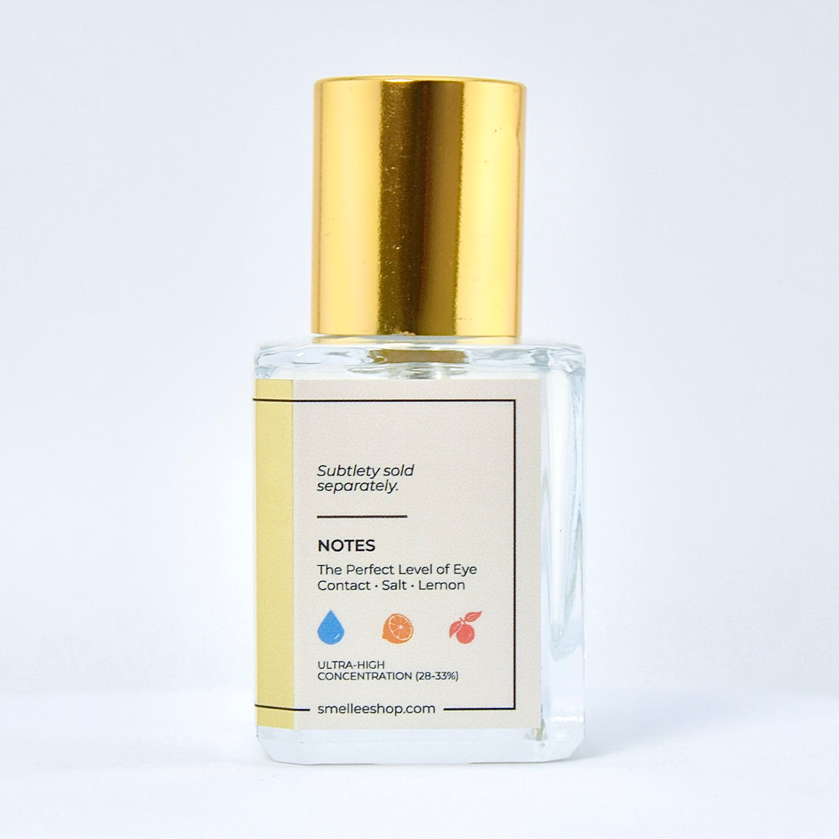 perfume bottle with gold cap on white background
