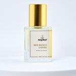 Perfume bottle labeled 'Her Roman Empire' with gold cap on a light gray background