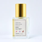 Perfume bottle with gold cap on a white background